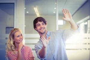 a man and woman discussing a business idea
