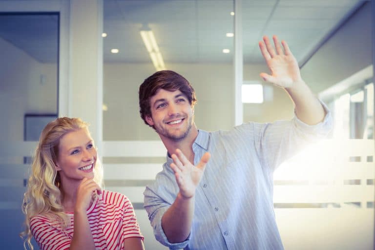 a man and woman discussing a business idea