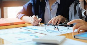 a view of some marketing analysis documents symbolising a marketing budget