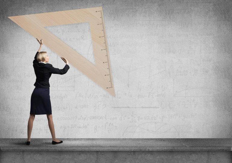 a lady holding a human size protractor indicating measuring marketing