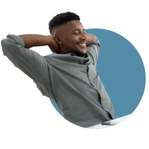 A happy and relaxed businessman who has used our strategies to build a successful mindset