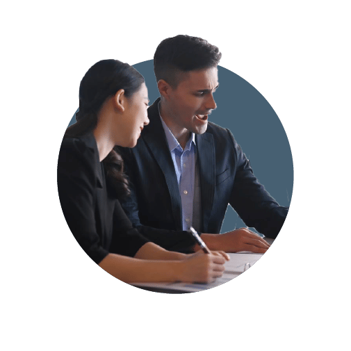 Two young professionals setting up a business and discussing Creating A Business Model that Scales: A Step by Step Guide.