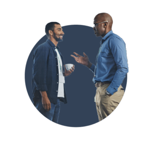 Two male business owners discussing the sales realities that successful business owners know