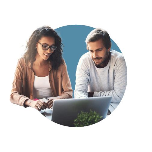 Two every day business owners using a laptop to research their market