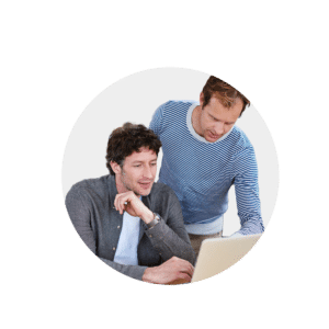Two professionals, one helping the other business owner choose a business bank account.