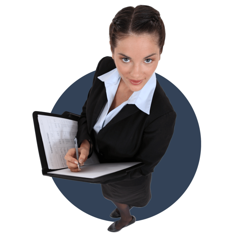 A female bookkeeper/accountant, suited and filling in documents