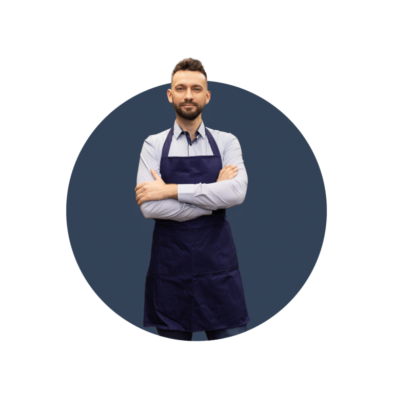 A male business owner wearing an apron, looking pleased because he knows 17 awesome tips every new business owner should know.