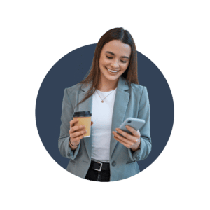 A young female business owner, drinking coffee and scrolling through her phone after reading Building and Improving Your Reputation Online - A Complete Guide by Go Impartial